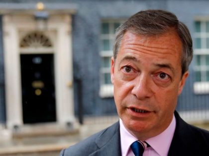 Brexit Party leader Nigel Farage talks to members of the media after delivering a letter a