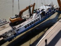 BUDAPEST, HUNGARY - JUNE 11: The tourist boat the Mermaid is raised from the Danube river on June 11, 2019 in Budapest, Hungary. At least 20 people died in the May 29 accident when a larger sightseeing vessel collided with the Mermaid, a small boat carrying mostly South Korean tourists, …