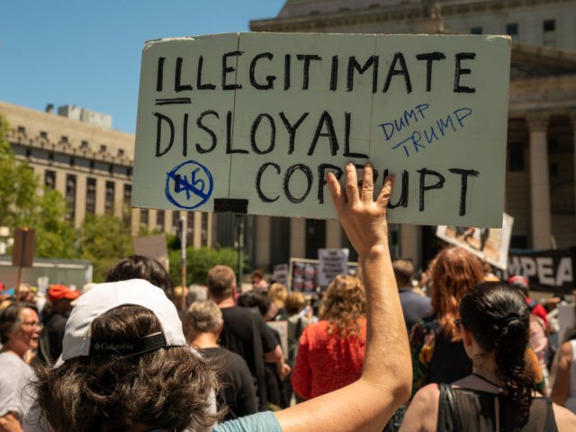 NEW YORK, NY - JUNE 15: Protestors attend a demonstration calling for the impeachment of U