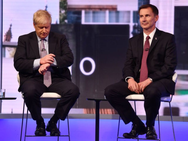 LONDON, ENGLAND - JUNE 18: In this handout photo provided by the BBC, (L-R) MP Boris Johns