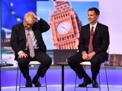 LONDON, ENGLAND - JUNE 18: In this handout photo provided by the BBC, (L-R) MP Boris Johnson and Secretary of State for Foreign Affairs Jeremy Hunt participate in a Conservative Leadership televised debate on June 18, 2019 in London, England. Emily Maitlis hosts the second of the televised Conservative Leadership …