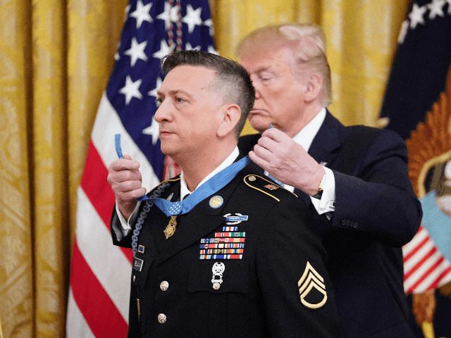 US President Donald Trump presents the Medal of Honor to David Bellavia in the East Room o