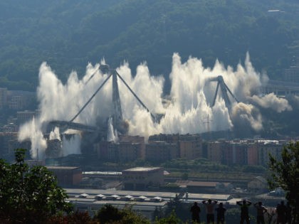GENOA, ITALY - JUNE 28: The pylons 10 and 11 of the collapsed Morandi viaduct are demolished with a controlled dynamite explosion on June 28, 2019 in Genoa, Italy. The Morandi viaduct collapsed on August 14, 2018 causing the death of 43 people. (Photo by Pier Marco Tacca/Getty Images)