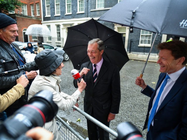 LONDON, ENGLAND - JUNE 07: Nigel Farage (L) and Richard Tice of the Brexit Party talk to the media after handing in a letter to 10 Downing Street on June 7, 2019 in London, England. Nigel Farage and Richard Tice of The Brexit Party delivered a letter to Prime Minister …