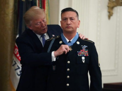Staff Sergeant David Bellavia Receives Medal Of Honor For Heroic Actions In Iraq WASHINGTON, DC - JUNE 25: U.S. President Donald Trump presents the Medal of Honor the U.S. Army Staff Sgt. David Bellavia Ret., during a ceremony in the East Room at the White House, on June 25, 2019 …