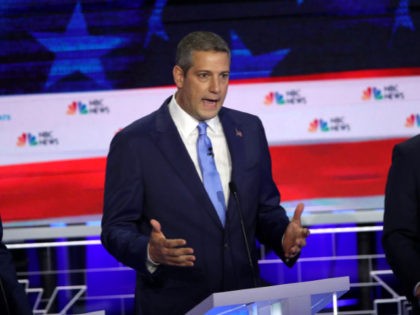 MIAMI, FLORIDA - JUNE 26: Rep. Tim Ryan (D-OH) speaks as New York City Mayor Bill De Blasio (L) and former housing secretary Julian Castro (R) look on during the first night of the Democratic presidential debate on June 26, 2019 in Miami, Florida. A field of 20 Democratic presidential …