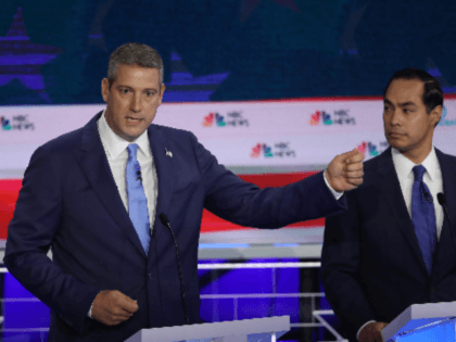 Rep. Tim Ryan (D-OH) speaks as former housing secretary Julian Castro looks on during the