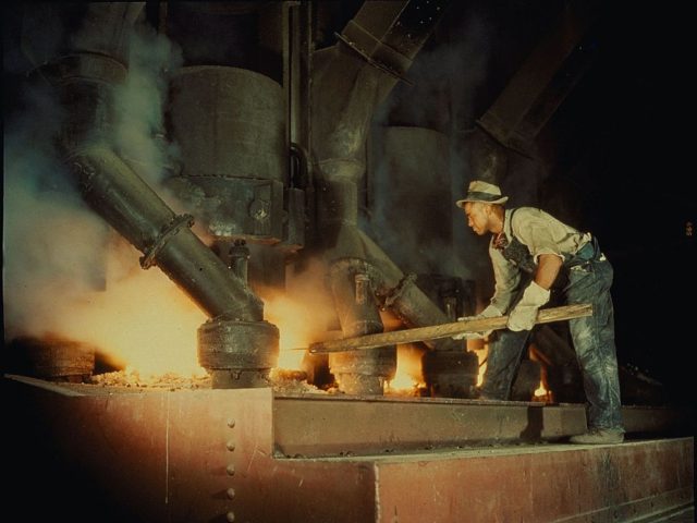 June 1942: Workman at an electric phosphate smelting furnace in a Tennessee Valley Author