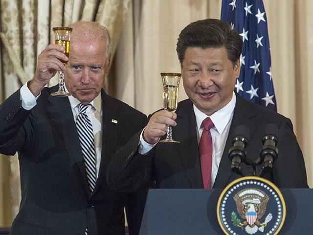 (L-R) US Vice President Joe Biden, Chinese President Xi Jinping and US Secretary of State