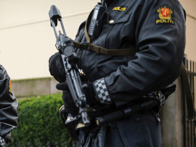 Armed police guard the Nobel institute ahead of a press conference with the Nobel Peace Pr