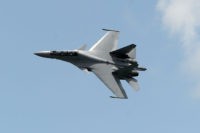 A Sukhoi SU-30 fighter jet from the Royal Malaysian Air Force performs a slow fly past during the Singapore Airshow at Changi exhibition center in Singapore on February 16, 2016. AFP PHOTO / ROSLAN RAHMAN / AFP / ROSLAN RAHMAN (Photo credit should read ROSLAN RAHMAN/AFP/Getty Images)