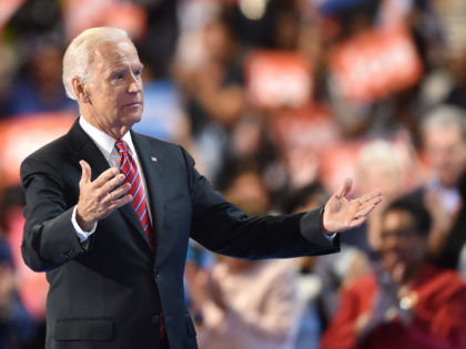 US Vice President Joe Biden hugs his wife Jill after speaking on the third evening session