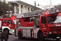 Athens, GREECE: Fire brigade truck are parked in front of the US Embassy in Athens after unknown assailants fired a rocket into the facility early 12 January 2007, causing damage to the building but no casualties, police and US officials said. Police sources said the rocket penetrated the building near …