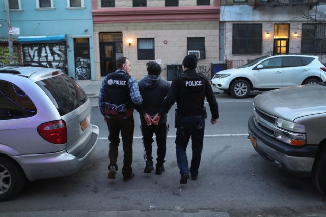 NEW YORK, NY - APRIL 11: U.S. Immigration and Customs Enforcement (ICE), officers arrest an undocumented Mexican immigrant during a raid in the Bushwick neighborhood of Brooklyn on April 11, 2018 in New York City. New York is considered a "sanctuary city" for undocumented immigrants, and ICE receives little or …
