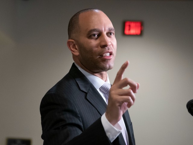Rep. Hakeem Jeffries, D-N.Y., the House Democratic Caucus chair, fends off reporters' questions about President Donald Trump and the Mueller report, at the Capitol in Washington, Monday, March 25, 2019. (AP Photo/J. Scott Applewhite)