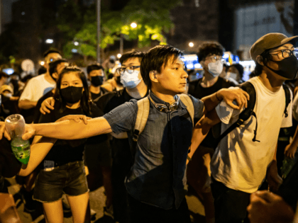 Pro independence activist Wayne Chan during a clash after a rally against the extradition law proposal at the Central Government Complex on June 10, 2019 in Hong Kong China. Over a million protesters marched in Hong Kong on Sunday against a controversial extradition bill that would allow suspected criminals to …