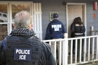 In this Feb. 9, 2017, photo provided U.S. Immigration and Customs Enforcement, ICE agents