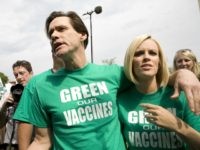 WASHINGTON - JUNE 4: Actor Jim Carrey and actress Jenny McCarthy speak with reporters before a march calling for healthier vaccines June 4, 2008 in Washington, DC. Many at the march are concerned about the connection between heavy metals in vaccines and autism. (Photo by Brendan Hoffman/Getty Images)