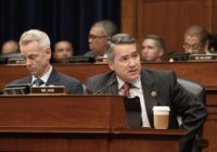House Committee on Oversight and Government Reform members Rep. Jody Hice, R-Ga., right, accompanied by Rep. Steve Russell, R-Okla., speaks on Capitol Hill in Washington, Wednesday, June 15, 2016, during the committee's hearing to consider a censure of IRS Commissioner John Koskinen. (AP Photo/Lauren Victoria Burke)