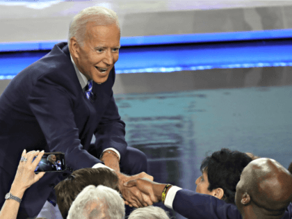 MIAMI, FLORIDA - JUNE 27: Democratic presidential candidate former Vice President Joe Biden greets members of the audience after the second night of the first Democratic presidential debate on June 27, 2019 in Miami, Florida. A field of 20 Democratic presidential candidates was split into two groups of 10 for …