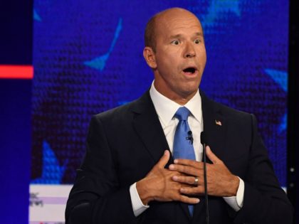 Democratic presidential hopeful former US Representative for Maryland's 6th congressional district John Delaney gestures as he speaks during the first Democratic primary debate of the 2020 presidential campaign season hosted by NBC News at the Adrienne Arsht Center for the Performing Arts in Miami, Florida, June 26, 2019. (Photo by …