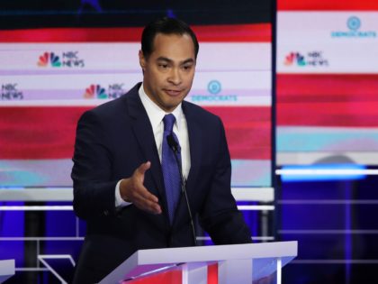 MIAMI, FLORIDA - JUNE 26: Former housing secretary Julian Castro and Sen. Cory Booker (D-N