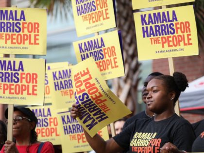 Kamala Harris supporters amongst South Carolina Democratic Party Convention attendees line up outside of the Metropolitan Convention Center in Columbia, SC on June 22, 2019. - Many of the Democratic candidates running for president are in Columbia to make appearances at the South Carolina Democratic Party Convention and the Planned …