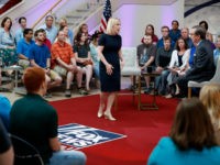 Democratic presidential candidate Sen. Kirsten Gillibrand talks with FOX News Anchor Chris Wallace, right, during a FOX News town hall, Sunday, June 2, 2019, in Dubuque, Iowa. (AP Photo/Charlie Neibergall)