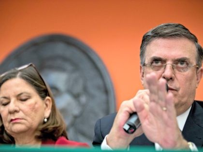 Mexican Foreign Affairs Secretary Marcelo Ebrard, right, accompanied by Mexican Ambassador Martha Barcena Coqui, speaks during a news conference at the Mexican Embassy in Washington, Monday, June 3, 2019, as part of a Mexican delegation in Washington for talks following trade tariff threats from the Trump Administration. (AP Photo/Andrew Harnik)