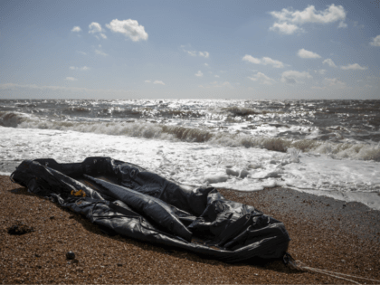 DOVER, ENGLAND - APRIL 04: An inflatable rib lies in the surf near Samphire Hoe on April 4, 2019 in Dover, England. Two separate incidents of migrants coming ashore have been reported along the Kent coast near Folkestone this morning. (Photo by Dan Kitwood/Getty Images)