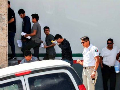 Migrants returned from the United States to Mexico, are transferred to the facilities of the Mexican National Institute of Migration in Ciudad Juarez, Chihuahua, Mexico, Monday. (Herika Martinez/AFP/Getty Images)