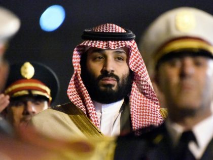 Saudi Crown Prince Mohammed bin Salman is seen behind a military band upon his arrival at Algiers International Airport, southeast of the capital Algiers on December 2, 2018. (Photo by RYAD KRAMDI / AFP) (Photo credit should read RYAD KRAMDI/AFP/Getty Images)