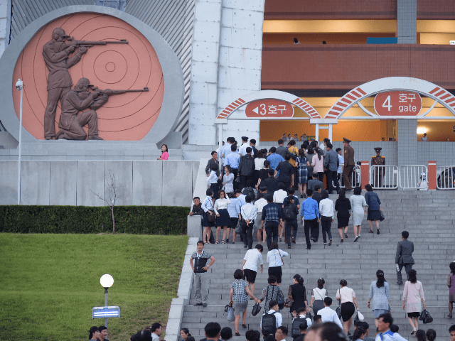 In a photo taken on June 4, 2019 sepctators arrive for a 'Grand Mass Gymnastics and Artist