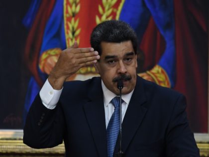 Venezuelan President Nicolas Maduro gestures as he speaks during the Simon Bolivar national journalism award ceremony at Miraflores presidential palace in Caracas on June 27, 2019. (Photo by Yuri CORTEZ / AFP) (Photo credit should read YURI CORTEZ/AFP/Getty Images)