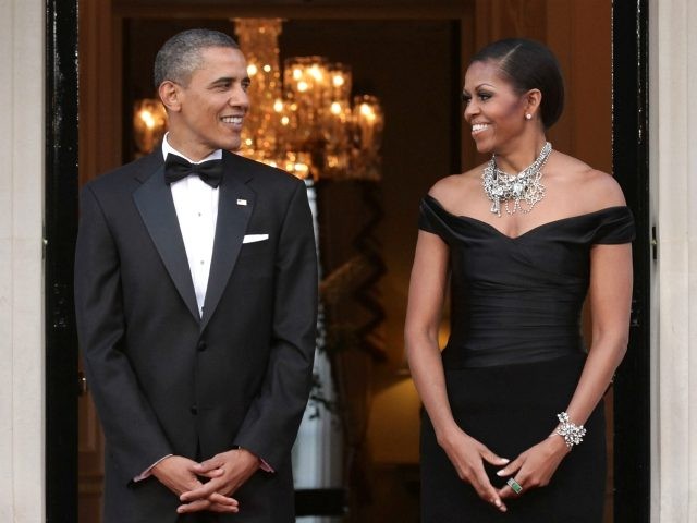 LONDON, ENGLAND - MAY 25: U.S. President Barack Obama and First Lady Michelle Obama arrive at Winfield House, the residence of the Ambassador of the United States of America, in Regent’s Park, on May 25, 2011 in London, England. The 44th President of the United States, Barack Obama, and First …