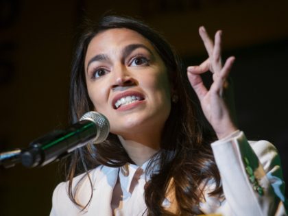 FILE - In this May 13, 2019, file photo Rep. Alexandria Ocasio-Cortez, D-N.Y., speaks at the final event for the Road to the Green New Deal Tour at Howard University in Washington. Ocasio-Cortez says any plan to adequately address climate change would cost at least $10 trillion. The Democrat is …