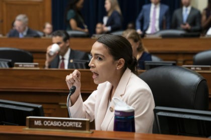 Rep. Alexandria Ocasio-Cortez, D-N.Y., makes an objection to a Republican argument as the House Oversight and Reform Committee considers whether to hold Attorney General William Barr and Commerce Secretary Wilbur Ross in contempt for failing to turn over subpoenaed documents related to the Trump administration's decision to add a citizenship …