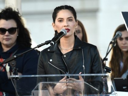 LOS ANGELES, CA - JANUARY 20: Olivia Munn speaks onstage at 2018 Women's March Los An