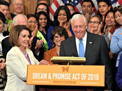 House Speaker Nancy Pelosi of Calif., front left, shakes hands with House Minority Whip Steny Hoyer, D-Md. front right, during an event on Capitol Hill in Washington, Tuesday, June 4, 2019, regarding the American Dream and Promise Act which offers a pathway to citizenship for those with Deferred Action for …