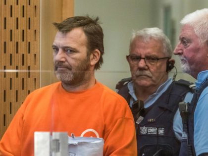 Philip Neville Arps, left, appears for sentencing in the Christchurch District Court, in Christchurch, New Zealand, Tuesday, June 18, 2019. The Christchurch businessman who shared a video of worshippers being slaughtered at a New Zealand mosque has been sentenced to 21 months in prison. (John Kirk-Anderson/Pool via AP)