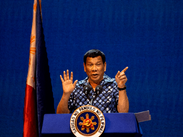 Philippine President Rodrigo Duterte gestures during the Partido Demokratiko Pilipino-LakasBayan (PDP-LABAN) meeting in Manila on May 11, 2019 ahead of the mid-term elections on May 13. (Photo by Noel CELIS / AFP) (Photo credit should read NOEL CELIS/AFP/Getty Images)