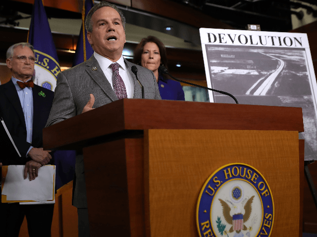 Rep. David Cicilline (D-RI) (2nd L) talks to reporters while announcing the House Democrats' new infrastructure plan during a news conference with Rep. Earl Blumenauer (D-OR) (L) and Rep. Cheri Bustos (D-IL) at the U.S. Capitol February 8, 2018 in Washington, DC. House Minority Leader Nancy Pelosi (D-CA) said the …