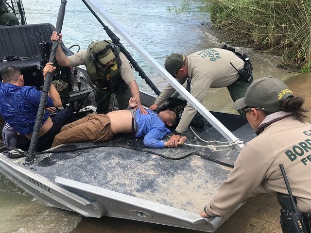 Del Rio Sector Border Patrol agents revive a 13-year-old migrant boy who drowned in the Rio Grande near Eagle Pass, Texas. (Photo: U.S. Border Patrol/Del Rio Sector)