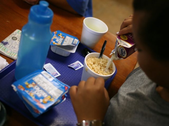 Seventeen year-old Marissa Hamilton pprepares her daily breakfast of Rice Krispies during