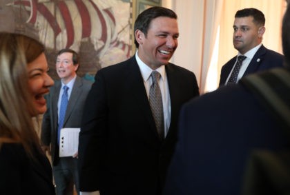 MIAMI, FLORIDA - JANUARY 09: Newly sworn-in Gov. Ron DeSantis greets people as he attends