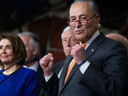 US Speaker of the House Nancy Pelosi (L) and Senate Democratic Leader Chuck Schumer (R) hold a press conference on Capitol Hill in Washington, DC, May 22, 2019, following a meeting with US President Donald Trump at the White House. (Photo by SAUL LOEB / AFP) (Photo credit should read …