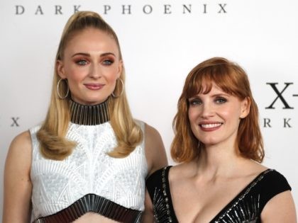 Actresses Sophie Turner and Jessica Chastain, right, pose as they arrive for an exclusive fan event of X-MEN: Dark Phoenix at a movie theater in London, Wednesday, May 22, 2019.(AP Photo/Frank Augstein)