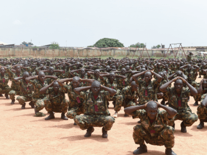 Recruits undergo training at the headquaters of the Depot of the Nigerian Army in Zaria, Kaduna State in northcentral Nigeria, on October 5, 2017. The Nigerian army train recruits to tackle the terror threat of the Islamist group Boko Haram in North East Nigeria. The Boko Haram's Islamist insurgency began …