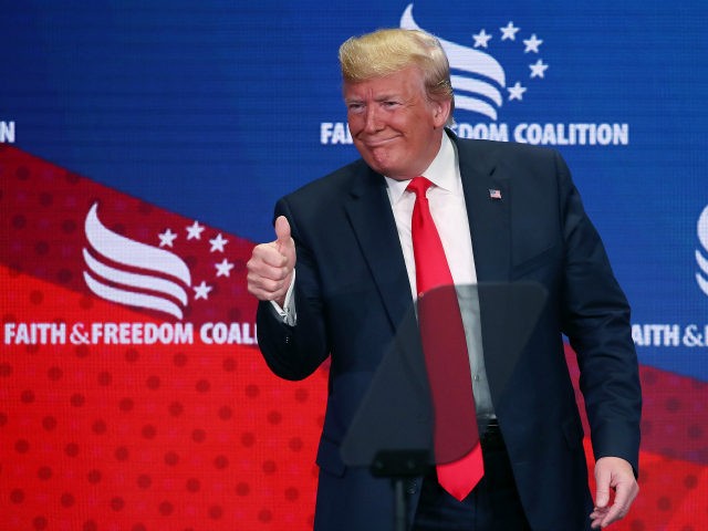 U.S. President Donald Trump gestures to the audience after speaking at the Faith & Freedom