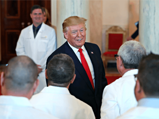 WASHINGTON, DC - JUNE 24: U.S. President Donald Trump greets healthcare workers after signing an executive order intended to improve quality and price transparency in healthcare during an event in the Grand Foyer of the White House on June 24, 2019 in Washington, DC. (Photo by Mark Wilson/Getty Images)